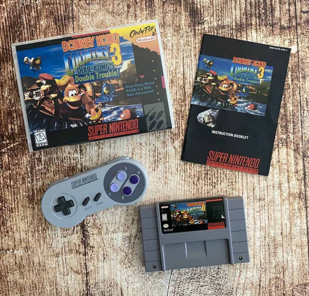 Donkey Kong Country 3 SNES cart, manual, box, and SNES controller