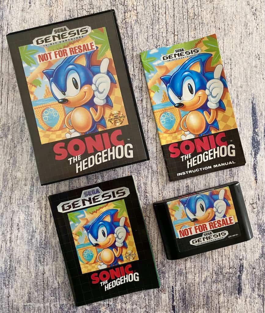 Sonic the Hedgehog 1 box, manual, cart, and poster