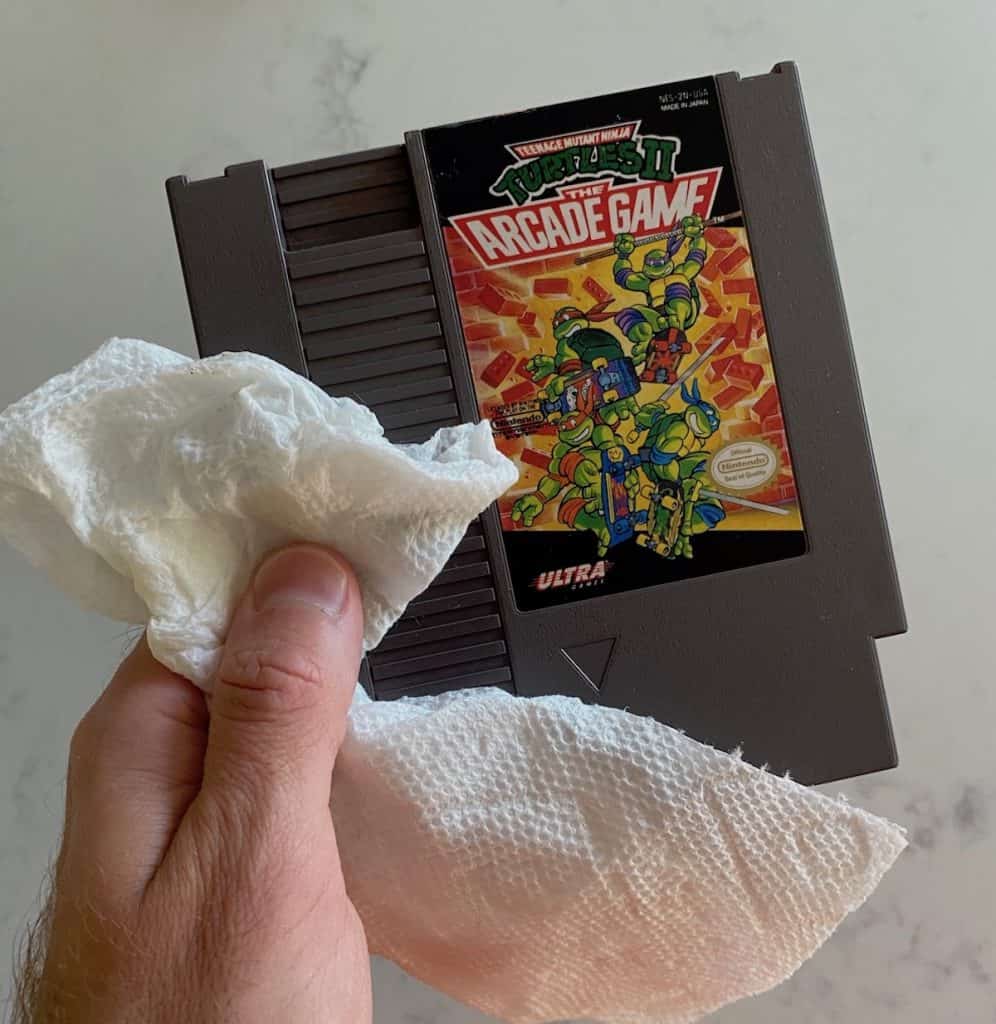 Cleaning Turtles II: The Arcade Game cart with a paper towel