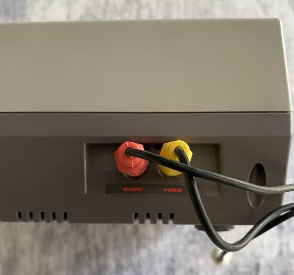 Composite cables connected to side of original NES