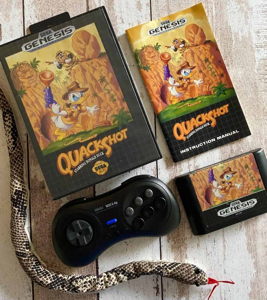 Quackshot for Sega Genesis box, manual, cart, 8bitdo 2.4 Genesis controller, and pretend snake